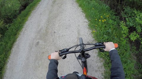 Childs point of view while riding bicycle 