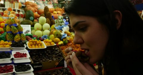Woman on Fruit Market in Municipal Market (Mercado Municipal) in Sao Paulo, Brazil