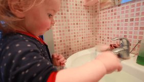 Video baby brushing teethbathroom