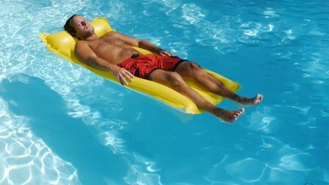 Man On Swimming Pool Raft Floating Stock Footage Video (100% Royalty ...