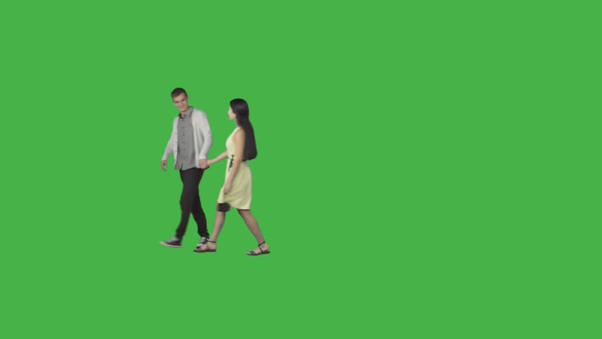 Guy & asian girl in yellow dress walks holding on hands. Footage with alpha channel. File format - .mov, codec PNG+Alpha. Shutter angle -180 (native motion blur)