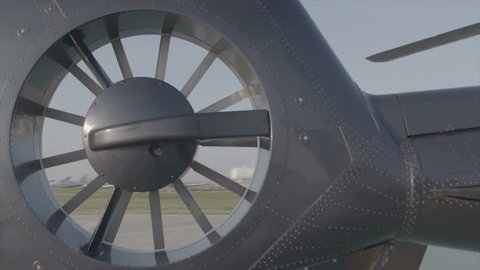 Detail shot of a landed helicopter in slow motion scene - slog3 color science