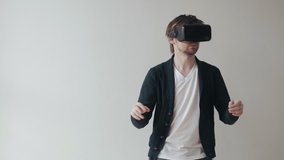 Man Using The Virtual Reality Headset, Doing Gestures And Looking Around