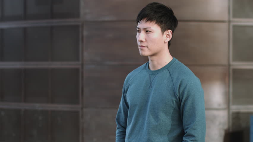 Portrait of Asian Male in city