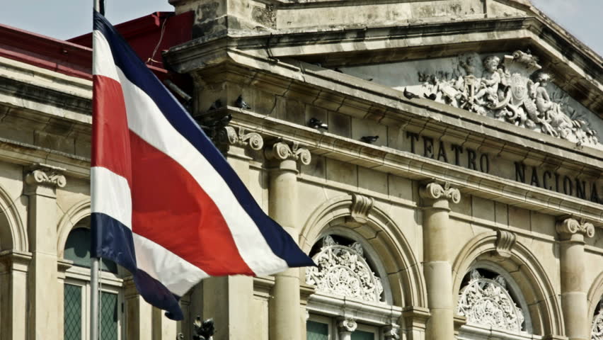 The flag of Costa Rica waving in front of the San José