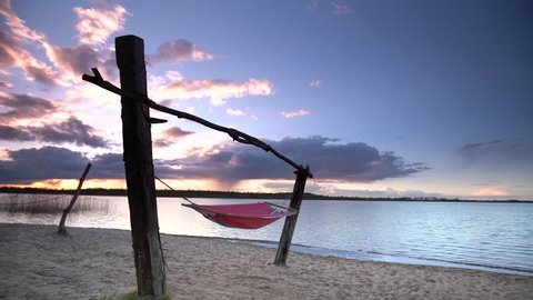 hammock at adventure beach on sunny spring day. enjoy sunset at hammock    