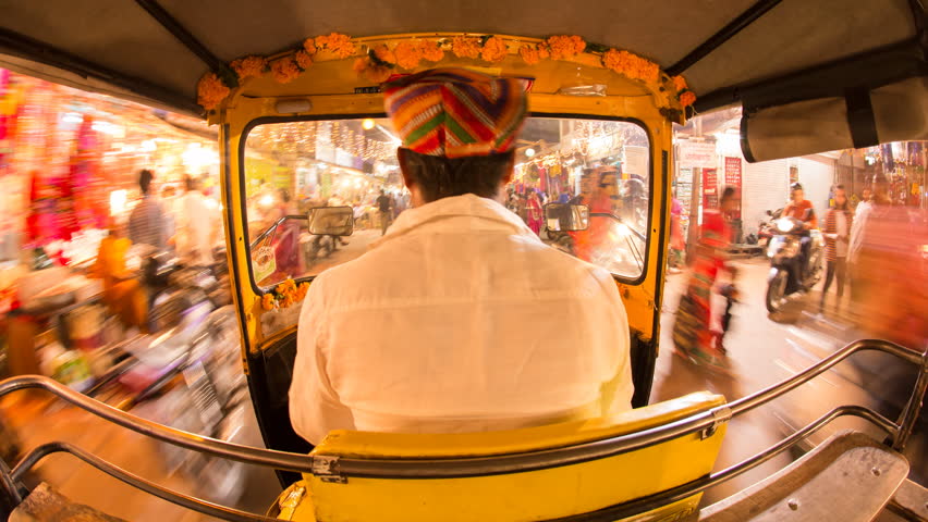 Autorickshaw POV busy illuminated old city streets, Udaipur, Rajasthan, India - 4K timelapse