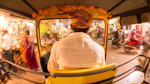 Autorickshaw POV busy illuminated old city streets, Udaipur, Rajasthan, India - 4K timelapse