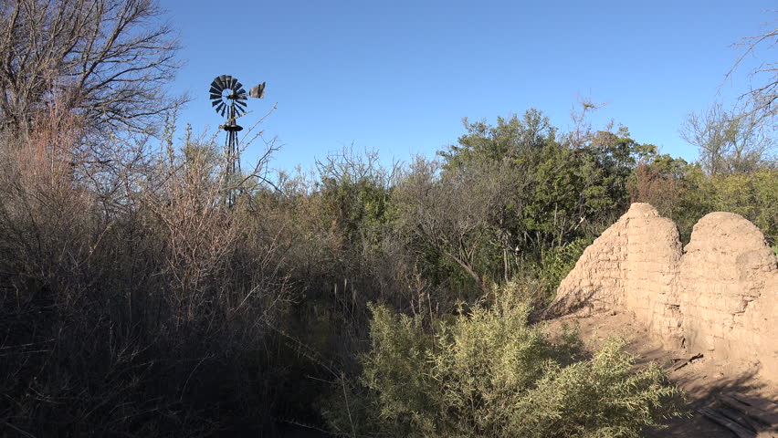 Adobe ruins and a windmill reveal a story of historic ranching in Big Bend National Park.