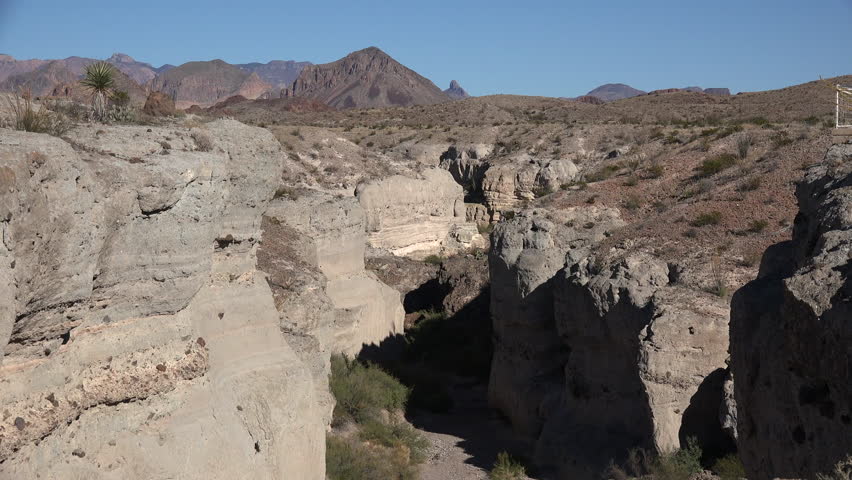 Steep walls have been carved by water in tuff rock in Big Bend National Park.