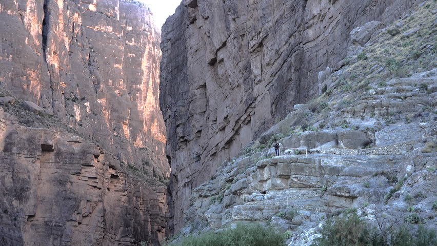 A tourist can been seen at a viewing platform high above the Rio Grande River in Big Bend National Park.