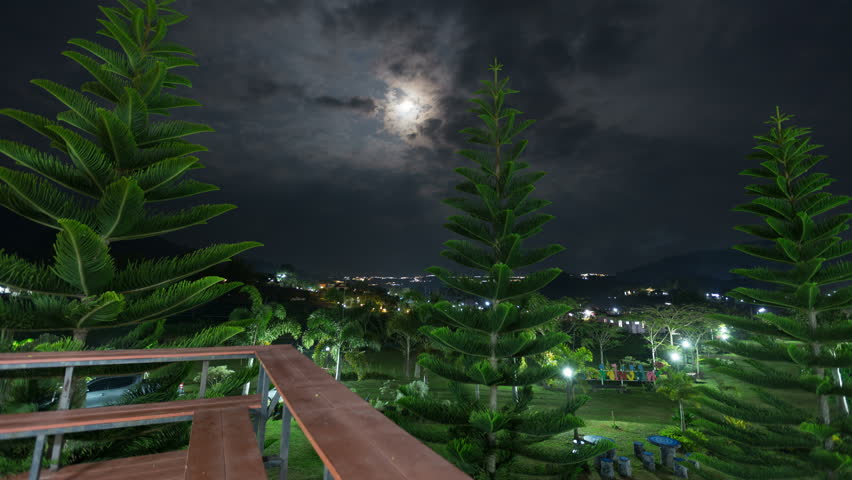 night sky with moon in rural area timelapse 4K UHD 3840x2160