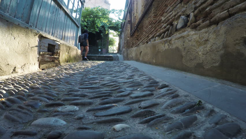Streets mountain village with girl
