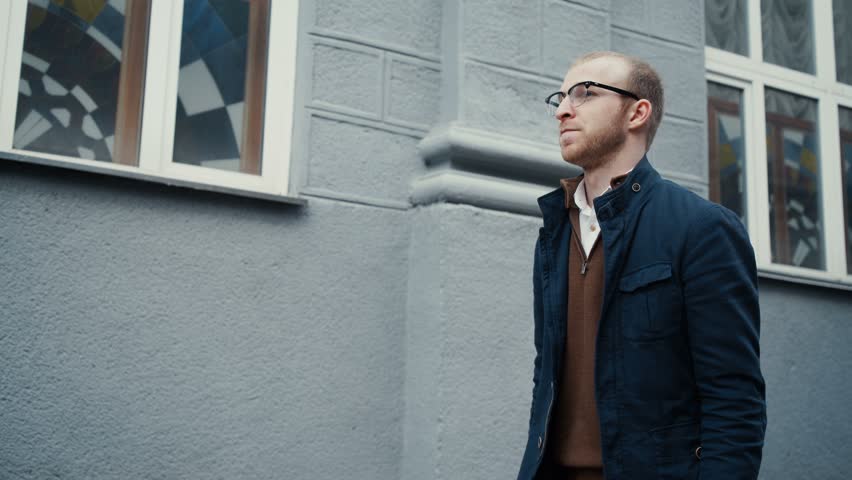 bearded man with e-cigarette outdoors
