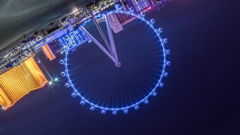 LAS VEGAS - April 2016: Zoom in on rotating Las Vegas High Roller Ferris Wheel on the Las Vegas Strip in Paradise, Nevada. It is currently the world's tallest Ferris wheel. FHD Timelapse.