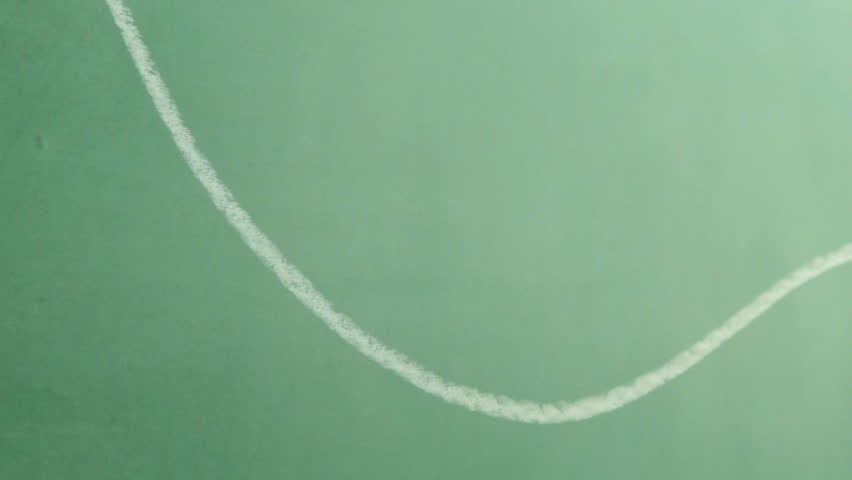 A hand draws shapes on a chalkboard