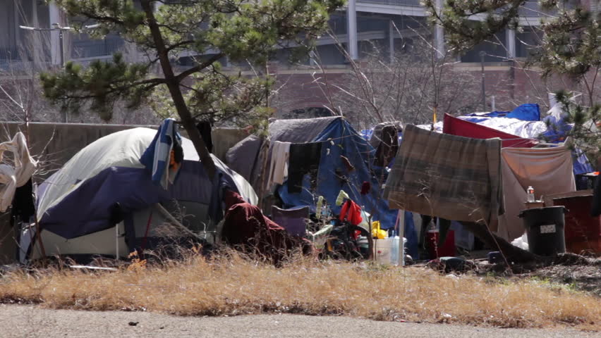 Homeless people set up a makeshift home in the city | Shutterstock HD Video #16240027