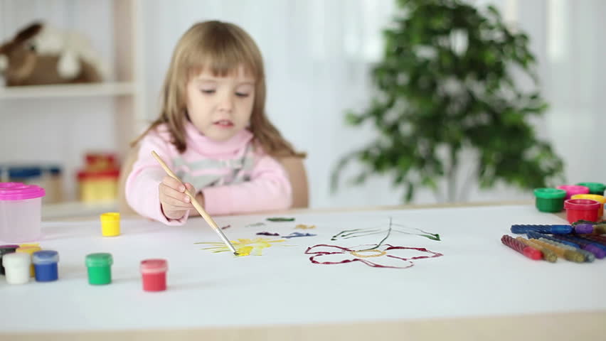 Girl learns to paint with gouache 