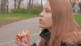 Teen girl eating a cake or pie. 4K UHD native video