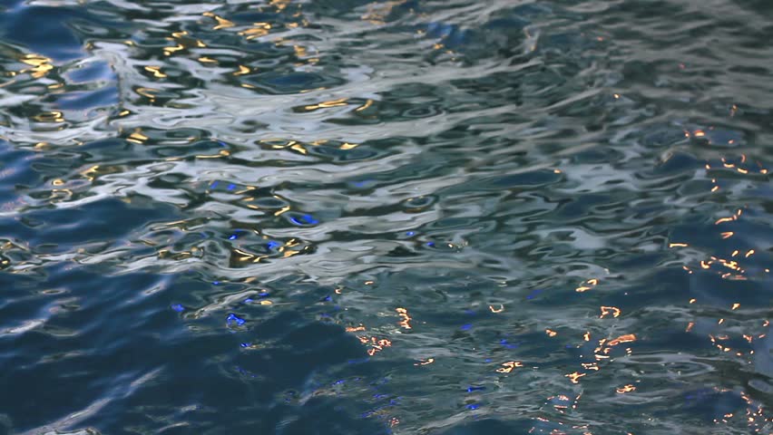 Color light reflections on sea surface 