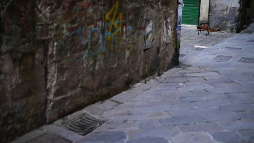 Old streets in Genoa, close to the port. Genoa (Genova) is the capital of Liguria, Italy.