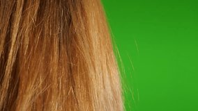 Woman blonde hair air-drying in front of green screen background slow-mo 1920X1080 HD footage - Hair blow-drying of  blond female chroma key greenscreen display 1080p FullHD video