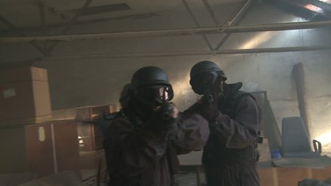 special forces running down attic Stock Video