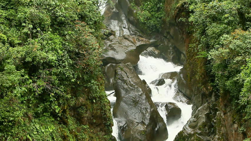 Vertical panning over Pailon del Diablo waterfall in Ecuador