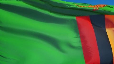 Zambia flag waving in slow motion against clean blue sky, seamlessly looped, close up, isolated on alpha channel with black and white luminance matte, perfect for film, news, digital composition