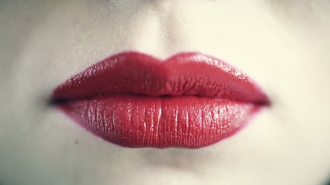 Woman biting lips

