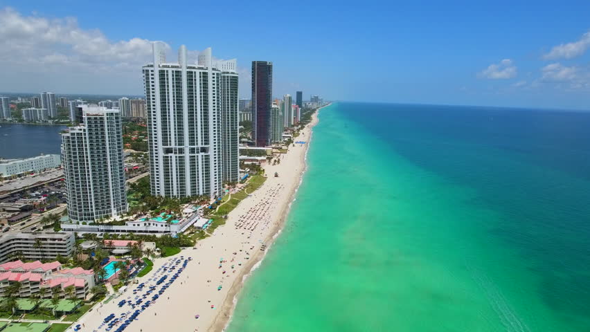 Tall buildings on the beach shot with a drone 4k Royalty-Free Stock Footage #16282444