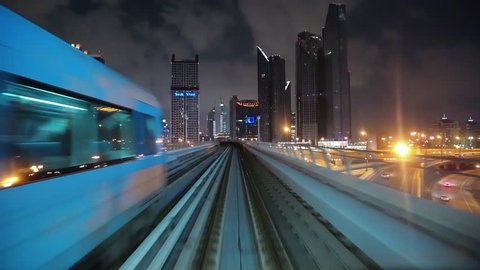 UAE, DUBAI, FEBRUARY 1, 2016: Journey on driverless, fully automated metro rail network in Dubai, UAE. The view through the front window. Dubai is a city and emirate in United Arab Emirates