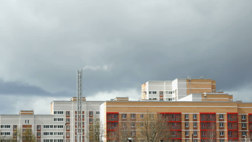 Multi-storey residential building. Thunderstorm