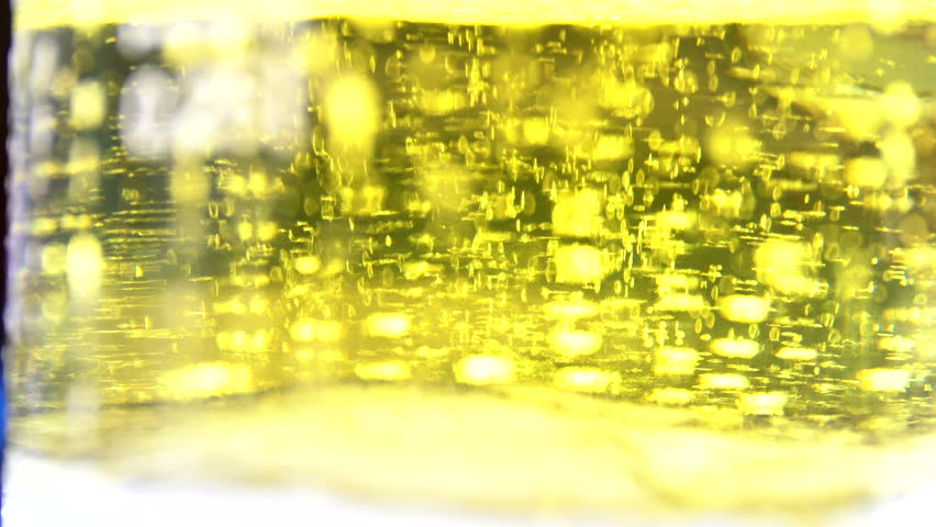 Glass full of beer slow moving bubbles 4K 3840X2160 UltraHD footage - Bubbles and foam moving fast in glass of beer 4K 2160p UHD video Royalty-Free Stock Footage #16287769