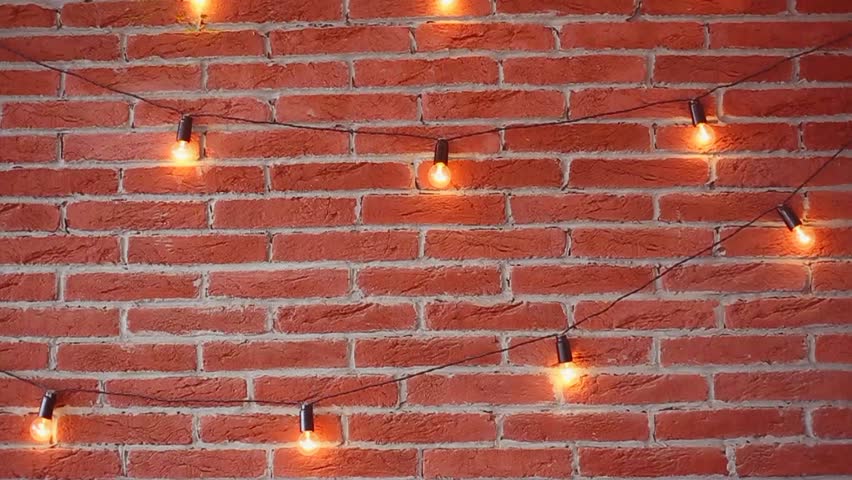 Video Of Real Brick Brown Wall With Lamp Lights Switching On And Off Brick Brown Wall With Lamp Lights