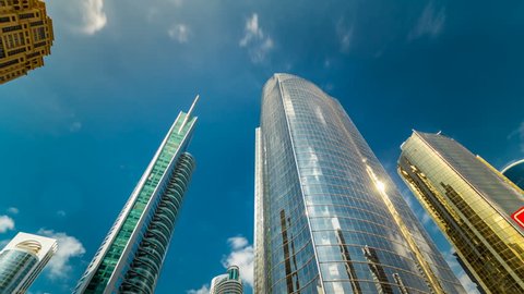 underside panoramic and perspective view to steel glass high rise building skyscrapers timelapse hyperlapse, Dubai, UAE