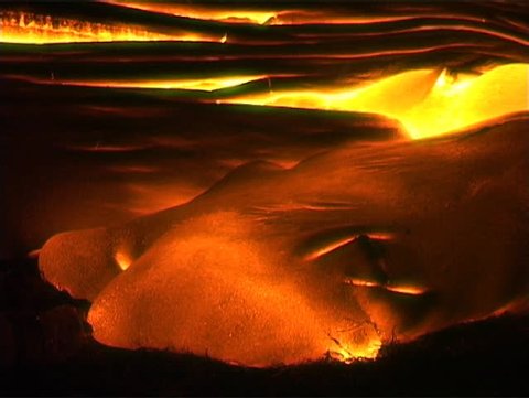 Lava oozing from a volcano forms strange otherworldly patterns.
