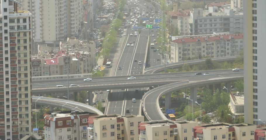 4k urban city busy traffic jams,QingDao,china.highway street & business houses building,air pollution. gh2_11351_4k