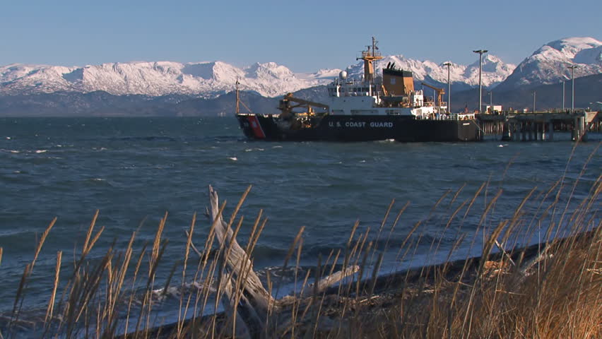 United States Coast Guard cutter docked in Kachemak Bay off the Homer Spit on a