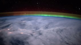 Planet Earth and Aurora Borealis seen from the ISS. Beautiful Planet Earth observed from space. Nasa time lapse shooting earth from space. Elements of this video furnished by NASA