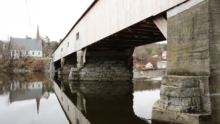 BATH, NEW HAMPSHIRE May 2nd: Ammonoosuc river flowing under the Bath covered bridge at Bath, New Hampshire on May 2nd, 2016 in Bath, Maine.