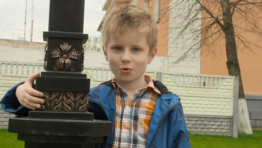 Successful happy boy in the park, outdoors