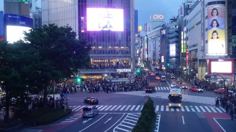TOKYO - April 22, 2016 : Shibuya Crossing. The crossing is one of the world's most famous examples of a Scramble Crosswalk.