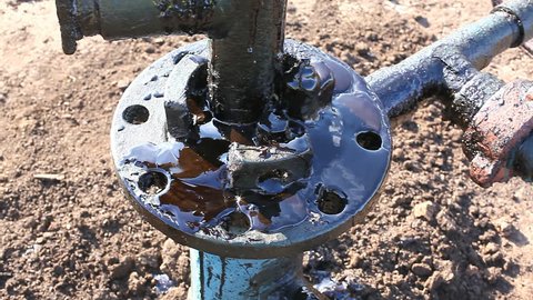 spilled oil from wells on land