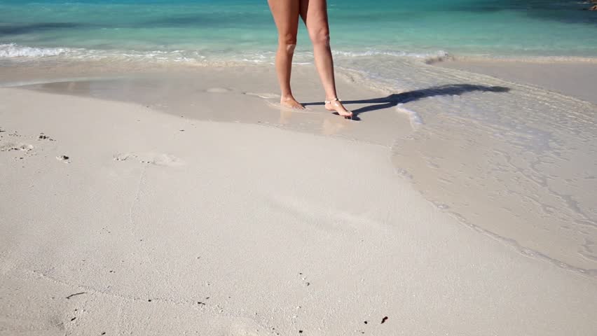Legs open at beach