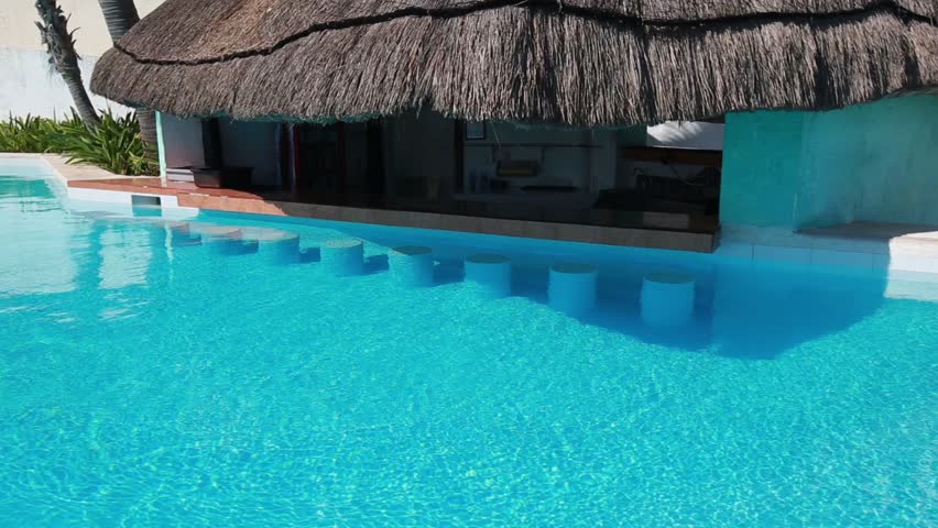 Swimming Pool Bar area with seats underwater at poolside

