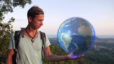 Traveler Holding Hologram Earth in Hand. Interactive Globe Map. Destination Travel Concept.   