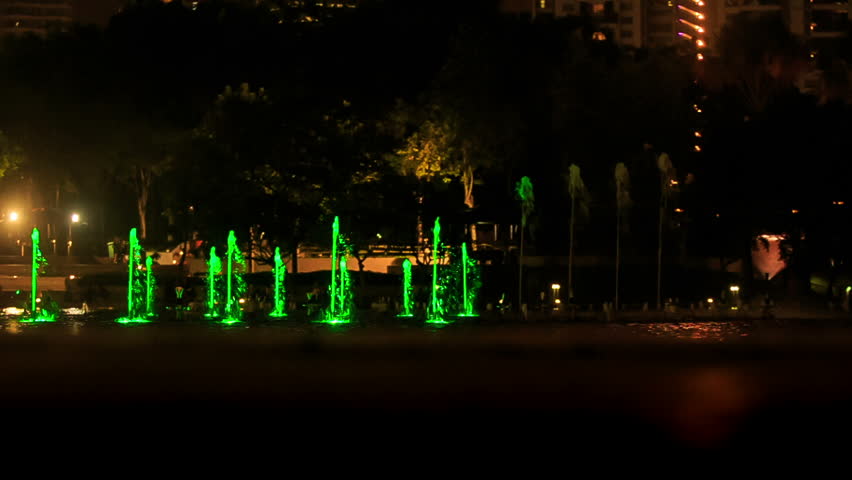 colourful fountains near Petronas Twin Towers change colour and height at night
