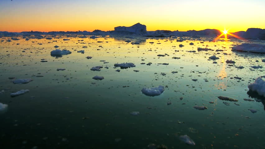 Arctic Sunset over Floating Ice Floes Royalty-Free Stock Footage #1641232