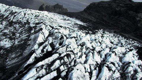 Aerial View of Sedimentary Volcanic Dust on Glacier, Iceland Stock Video